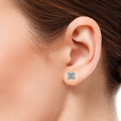 White gold four-stone diamond cluster earrings, front view
