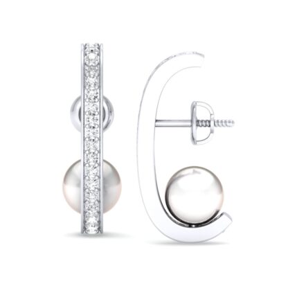 White gold crescent hoop pearl earring, close-up