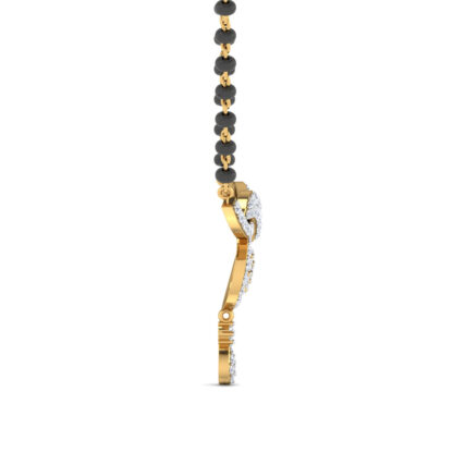 Close-up of yellow gold mangalsutra pendant showing the pear-shaped diamond drop