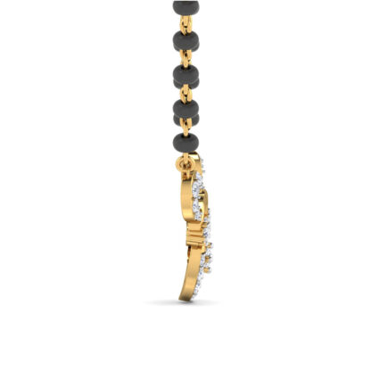 Side profile of yellow gold diamond scroll mangalsutra showing depth