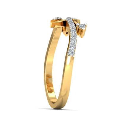 Side view of yellow gold bypass ring showing the pave diamond blade and diamond tip