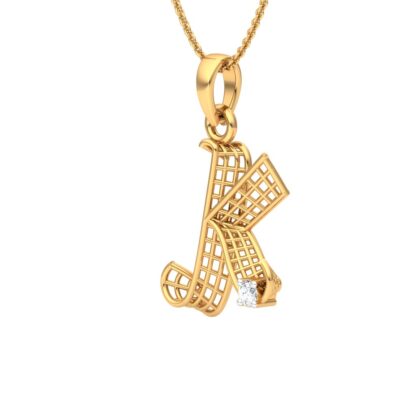 Angled view of yellow gold initial K pendant showing the lattice texture