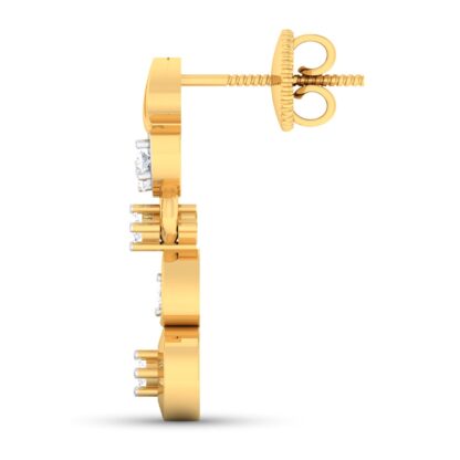 Close-up of yellow gold tiered diamond earrings showing the round disc drop