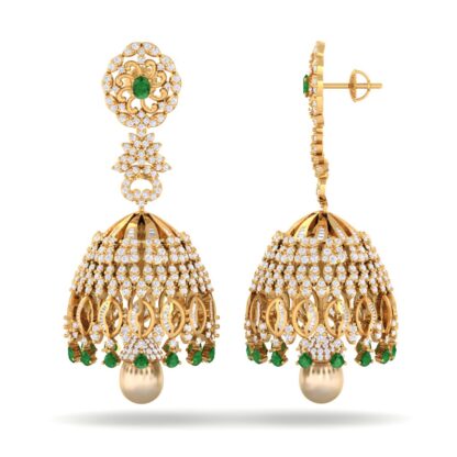 Close-up of yellow gold emerald diamond jhumka earring showing the pearl drop