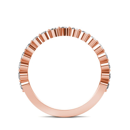 Through-finger view of rose gold bezel-set diamond half eternity band showing the band profile