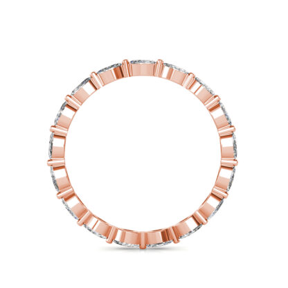 Through-finger view of rose gold marquise diamond station eternity ring showing the band profile