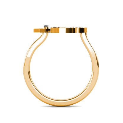 Through-finger view of yellow gold crescent moon and star diamond ring showing the band profile