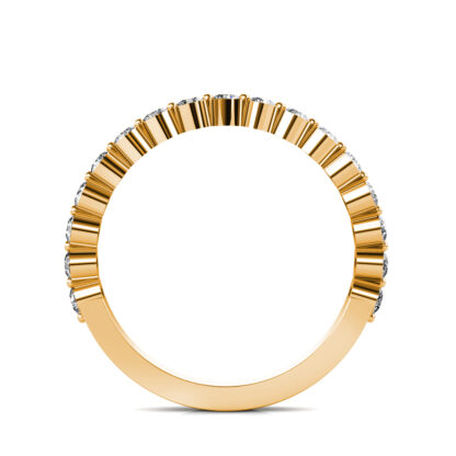 Through-finger view of yellow gold bezel-set diamond half eternity band showing the band profile