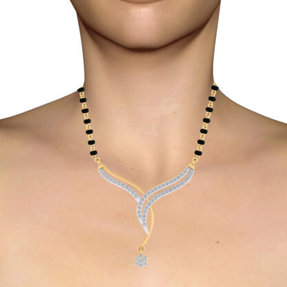 Yellow gold diamond ribbon flower mangalsutra worn on a model's neckline