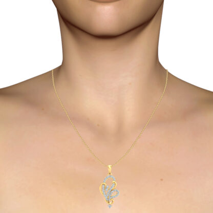 Yellow gold diamond scroll pendant worn on a model's neckline