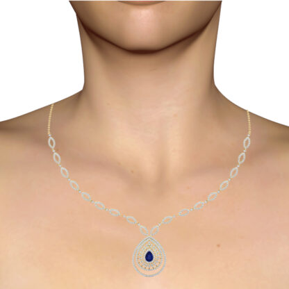 Yellow gold sapphire diamond sunburst necklace worn on a model's neckline