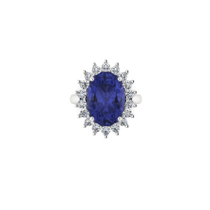 White gold oval sapphire diamond halo ring worn on finger