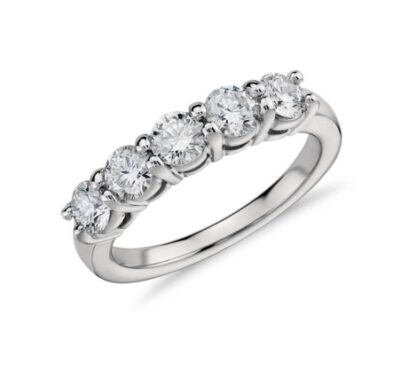 Perspective view of white gold or platinum five-stone ring with graduated prong-set round diamonds