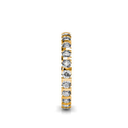 Side view of yellow gold bar-set diamond full eternity band showing the band depth and setting