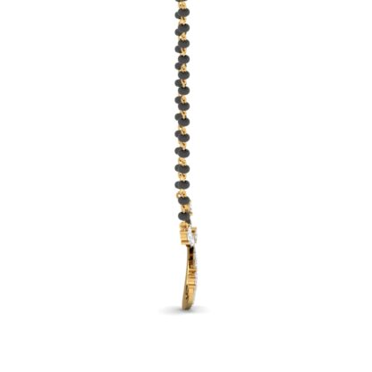 Angled view of yellow gold mangalsutra showing the diamond spiral detail