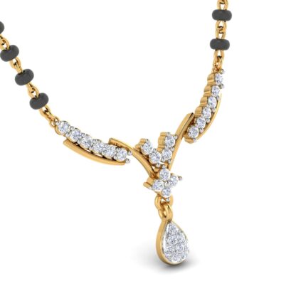 Close-up of yellow gold mangalsutra pendant showing the pear-shaped diamond drop