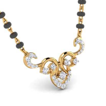 Close-up of yellow gold mangalsutra showing the symmetric scroll cluster