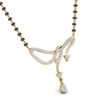 Close-up of yellow gold mangalsutra pendant showing the pear-shaped diamond drop