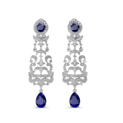 Angled view of white gold chandelier earrings showing the diamond filigree detail