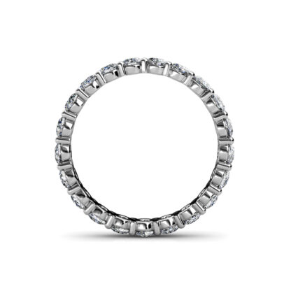 Through-finger view of white gold or platinum oval diamond full eternity ring showing the band profile