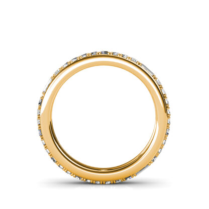 Through-finger view of yellow gold baguette and round diamond eternity ring showing the band profile
