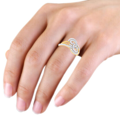 Yellow gold diamond spiral ring worn on hand