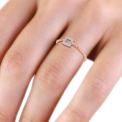Rose gold open square diamond ring worn on hand