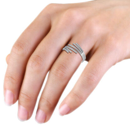 White gold diamond spiral wrap ring worn on hand