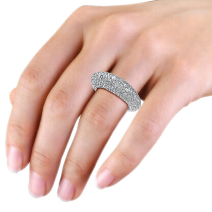 White gold or platinum full pave diamond dome ring worn on the hand