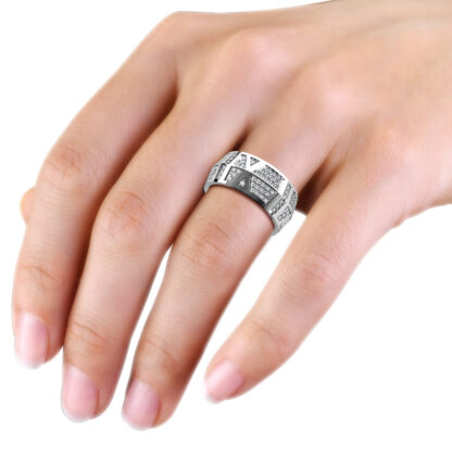 White gold or platinum wide pave diamond panel band worn on the hand