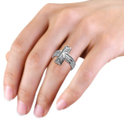 White gold or platinum pave diamond T shape statement ring worn on the hand