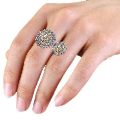 Yellow gold two-finger diamond sunburst cocktail ring worn on the hand