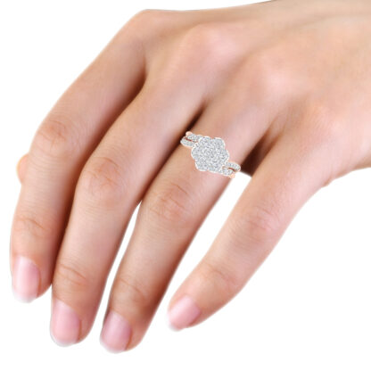 Rose gold diamond flower cluster ring worn on hand