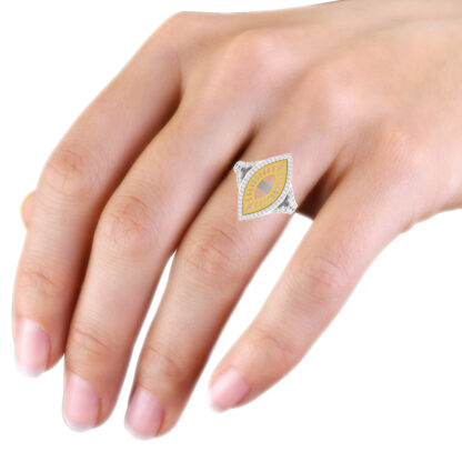 Two-tone diamond sunburst cocktail ring worn on hand