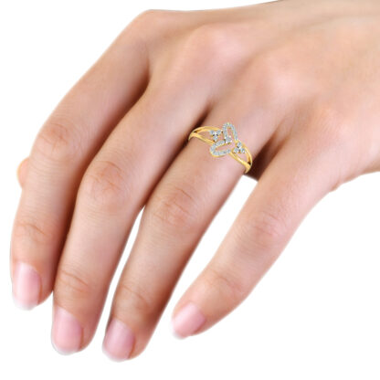 Yellow gold diamond ribbon loop ring worn on the hand