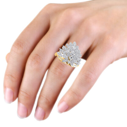 Two-tone gold diamond dahlia ring worn on hand