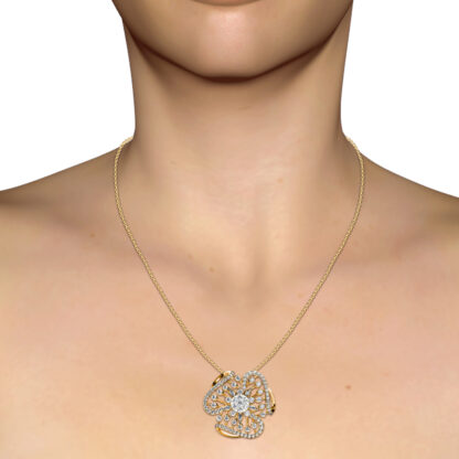 Yellow gold diamond flower pendant worn on the neck