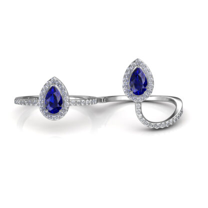 White gold sapphire two-finger ring worn on hand