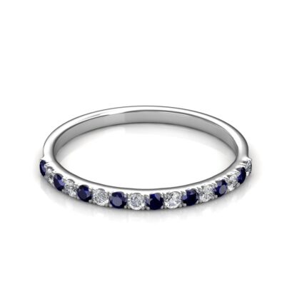Front view of white gold band with alternating prong-set blue sapphires and diamonds