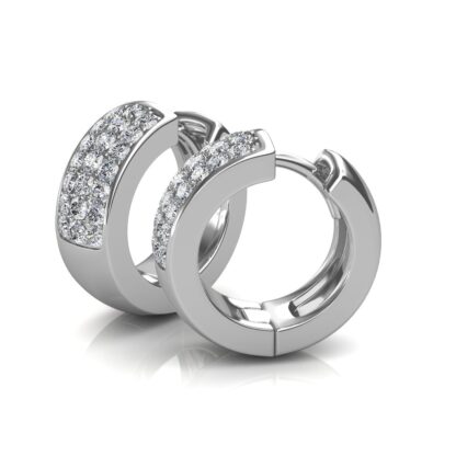 Side view of white gold huggie hoop earrings showing the wide pave diamond band