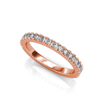 Perspective view of rose gold prong-set diamond half eternity ring