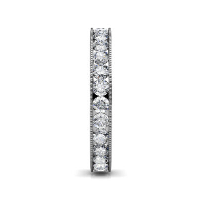 Side view of white gold milgrain channel-set diamond eternity ring showing the band depth and stone setting