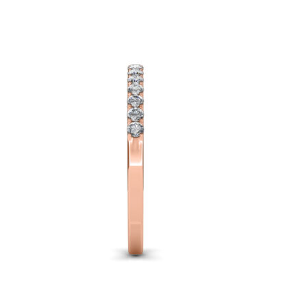 Side view of rose gold half eternity diamond ring showing the band depth and stone setting
