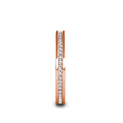 Side view of rose gold slim channel-set diamond eternity band showing the band depth and setting