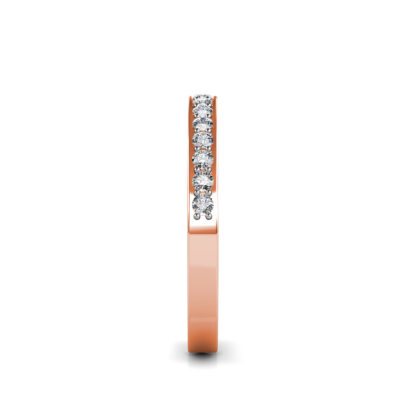 Side view of rose gold pave diamond half eternity band showing the band depth and stone setting