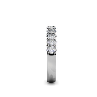 Side view of white gold or platinum oval diamond half eternity ring showing the band depth and setting