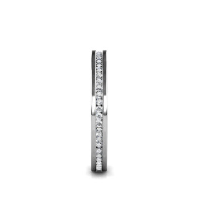 Side view of white gold or platinum slim channel-set diamond eternity band showing the band depth and setting