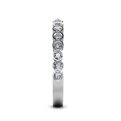 Side view of white gold or platinum bezel-set diamond half eternity band showing the band depth and stone setting