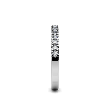 Side view of white gold or platinum shared-prong diamond half eternity band showing the band depth and stone setting
