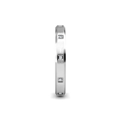 Side view of white gold or platinum beveled edge flush-set diamond band showing the band depth and stone setting